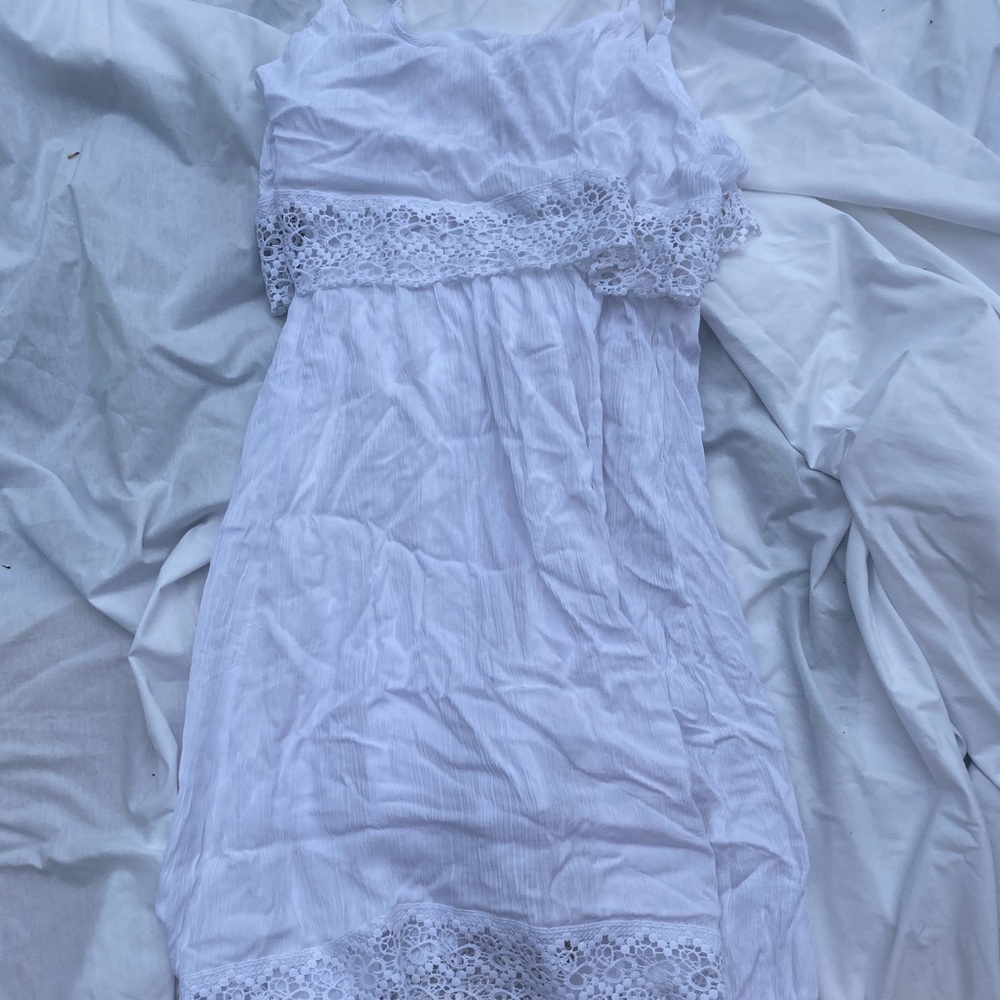 White dress. Flattering, lace detailing